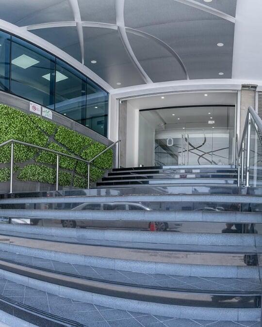 Dr. David Martinez scanning a patient with an intraoral scanner at EnamelDent Tijuana